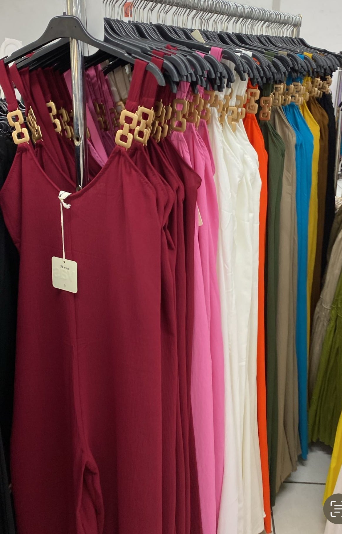 Iriana - Flowing jumpsuit with golden buckles
