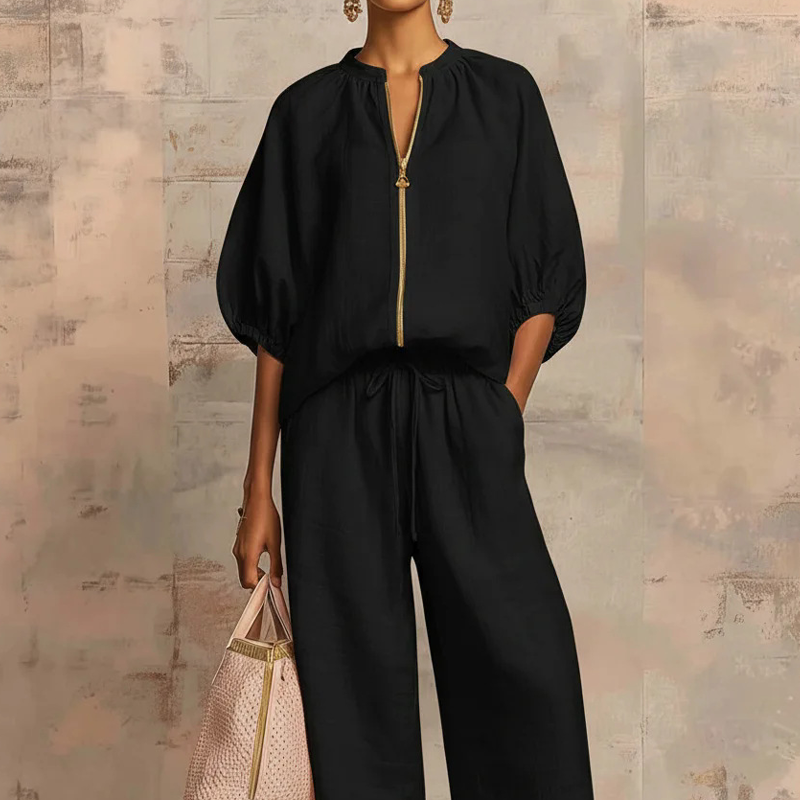 Calyndra - Women's solid color two-piece set with zipped top and wide-leg trousers