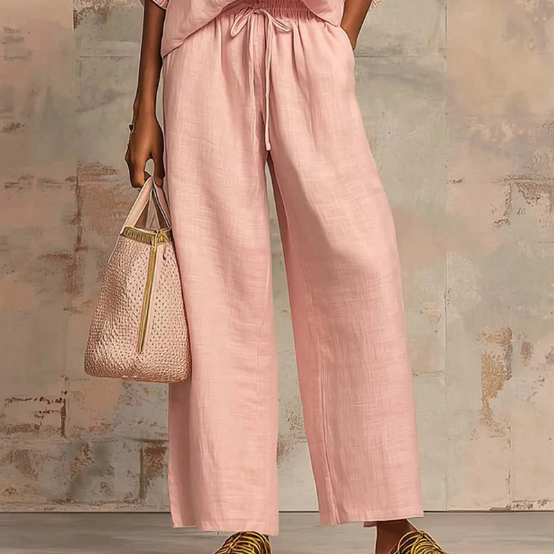 Calyndra - Women's solid color two-piece set with zipped top and wide-leg trousers