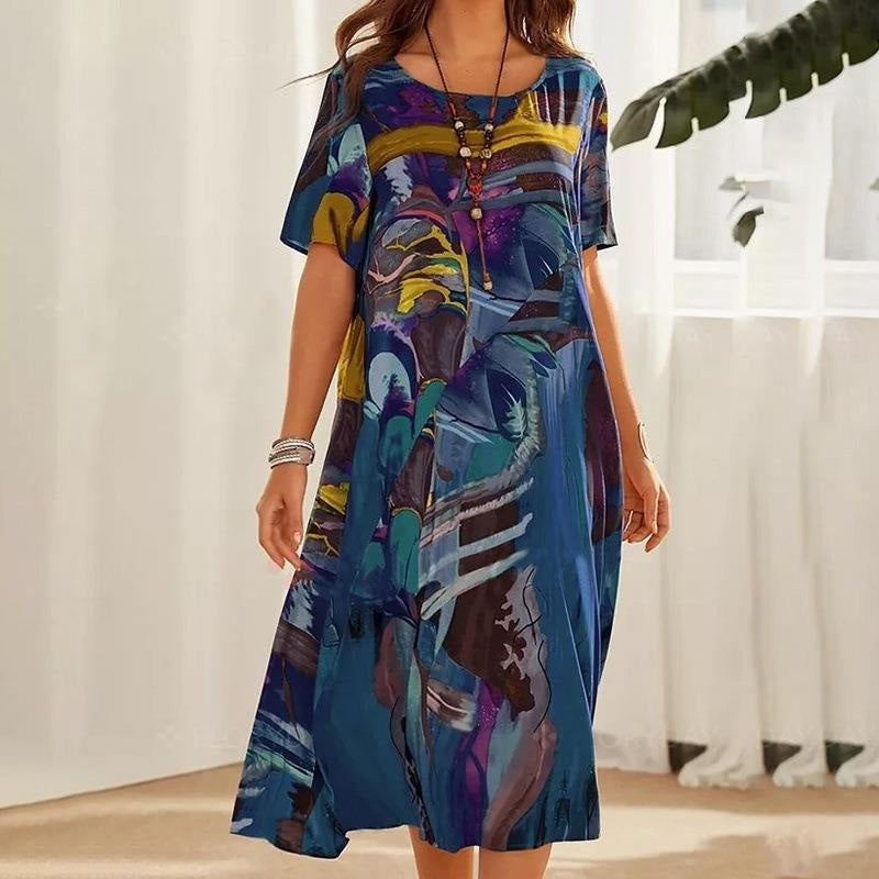 Nyelisse - Flowing dress in bright tropical colors