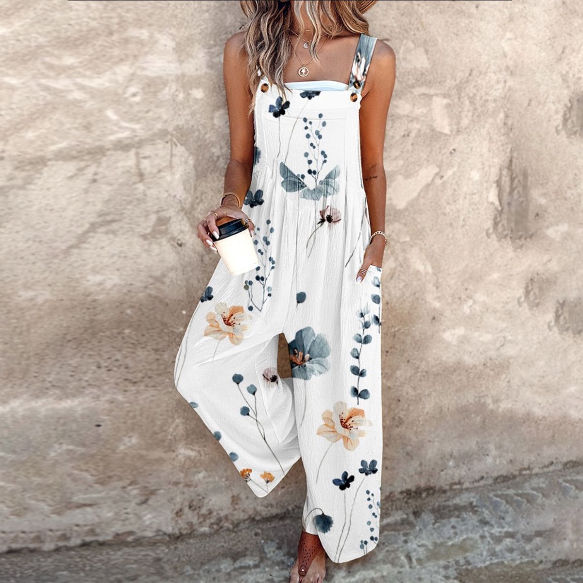Indira - Sleeveless jumpsuit with plant print for a fresh and elegant summer look