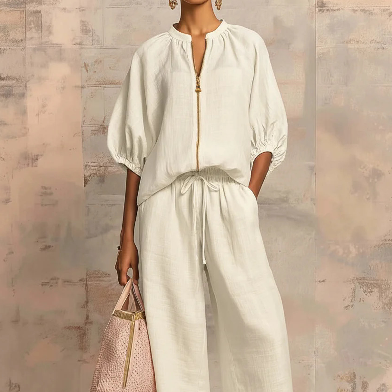 Calyndra - Women's solid color two-piece set with zipped top and wide-leg trousers
