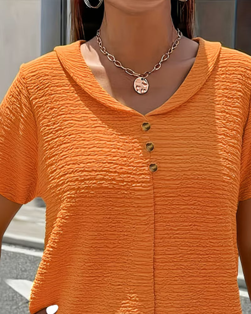 Syzelle - Women's textured round neck short sleeve t-shirt with decorative buttons, elegant