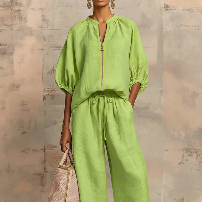 Calyndra - Women's solid color two-piece set with zipped top and wide-leg trousers