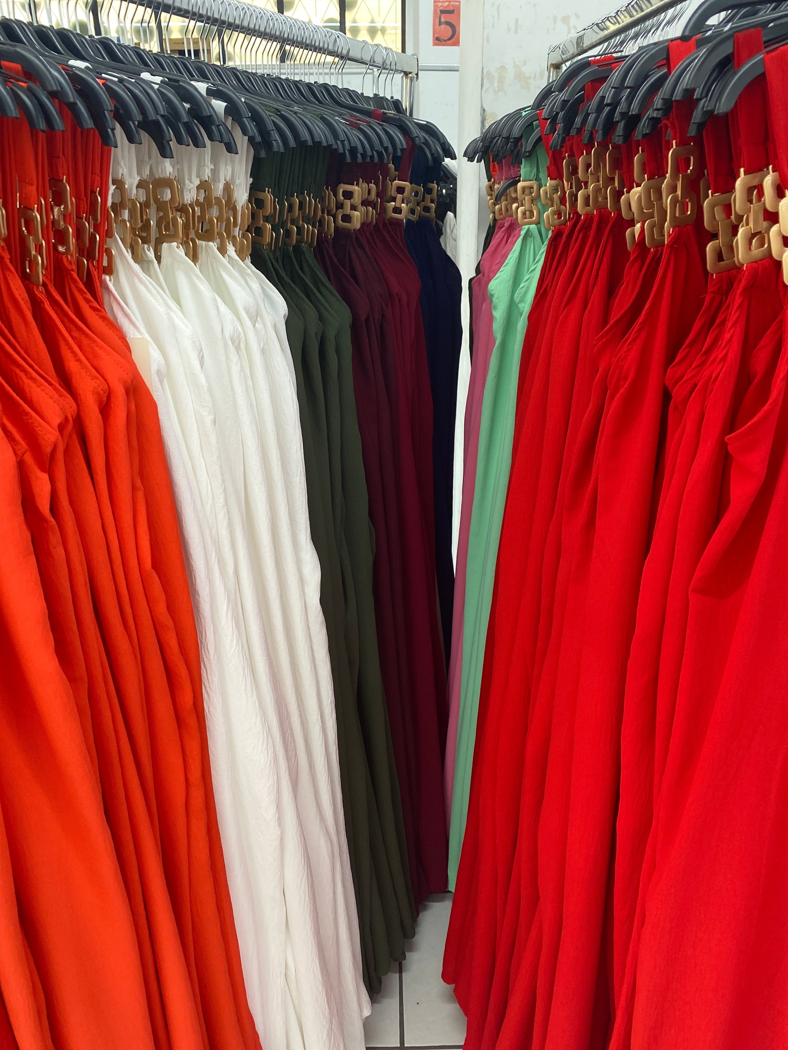 Iriana - Flowing jumpsuit with golden buckles
