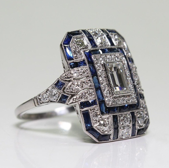 Vintage polished silver and blue zircon ring 