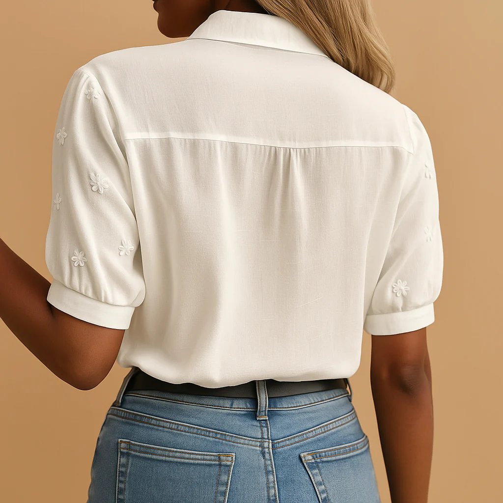 Tylarisse - Elegant white women's blouse with refined floral embroidery