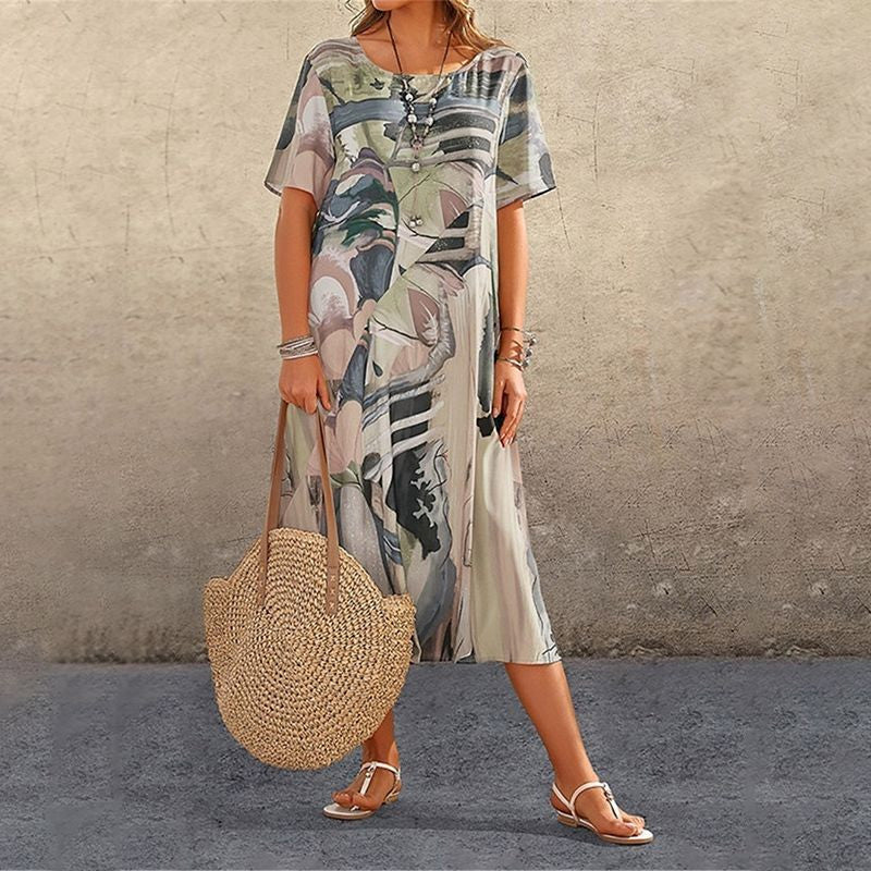 Nyelisse - Flowing dress in bright tropical colors