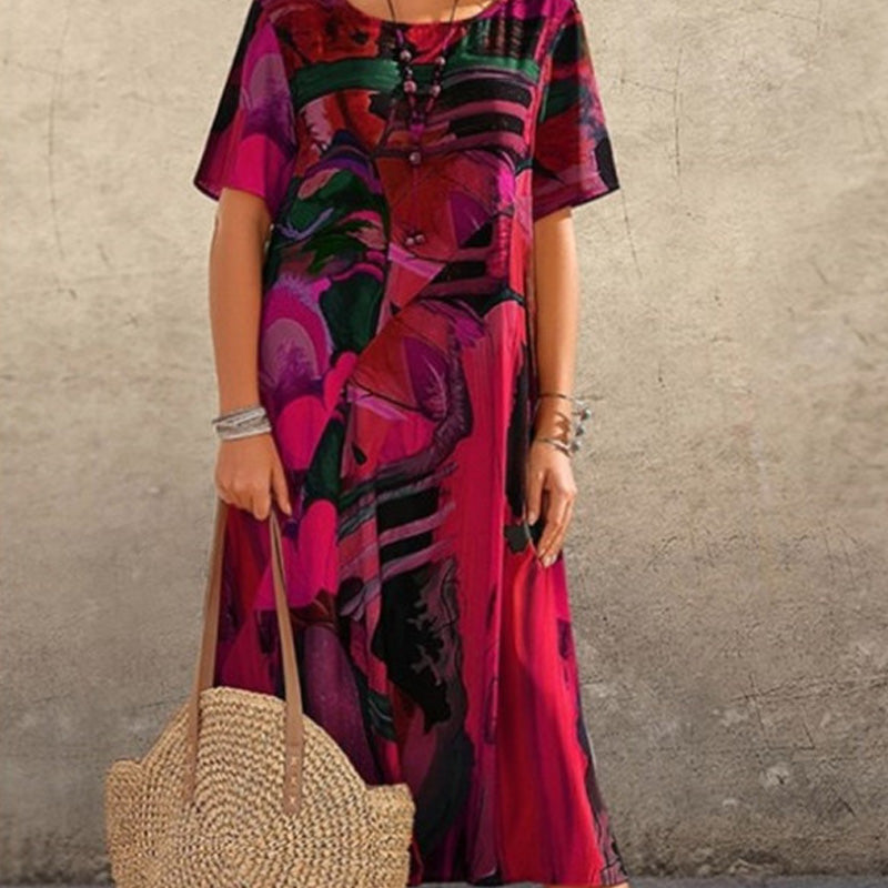 Nyelisse - Flowing dress in bright tropical colors