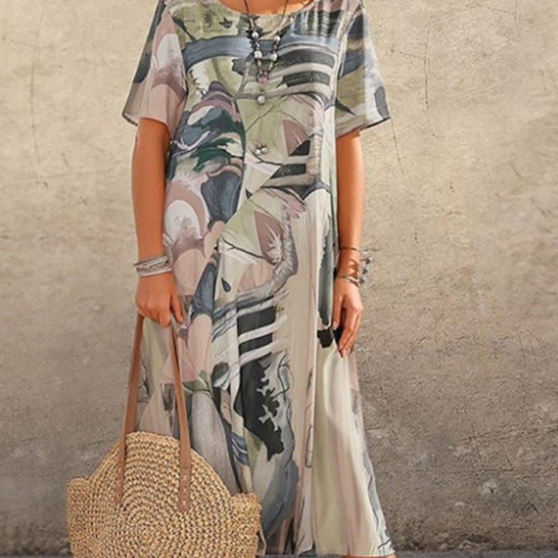 Nyelisse - Flowing dress in bright tropical colors